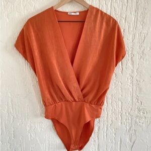 Zara Orange Bodysuit with V neck